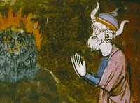 Detail from MS. Douce 211. Moses is shown in a medieval illustration in front of the Burning Bush, wearing a fine pair of horns as in other medieval illustrations - the result of a mistranslation in the Vulgate