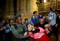 Uncircumcised rival Christians scrapping in the Church of the Holy Sepulchre, in Jerusalem, and having to be restrained by police, as they have to be most years at Christmas - rendering two of God's promises false